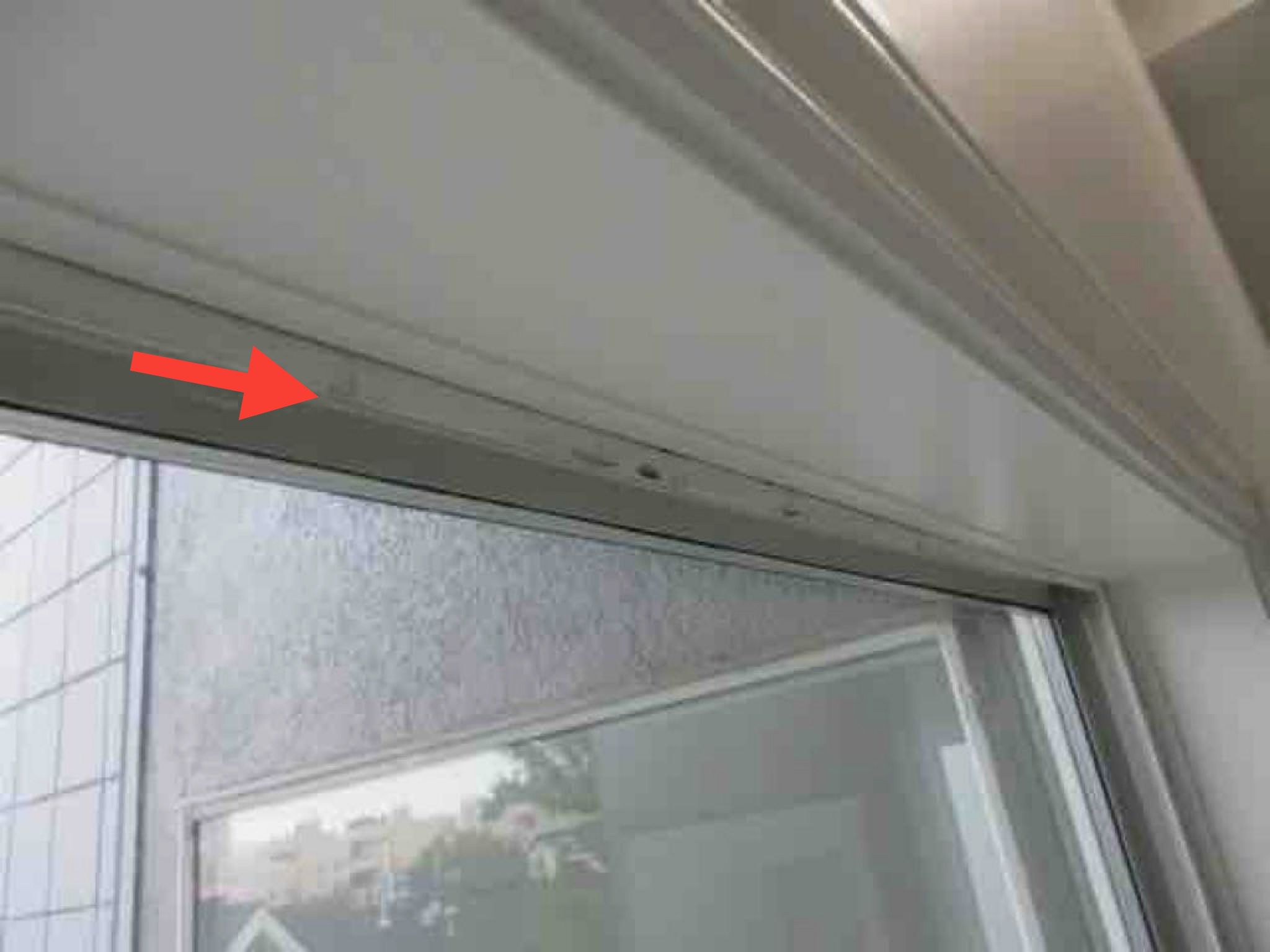 Window / envelope leakage stains at tops of windows